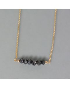 delicate necklace of gold with black diamonds, large