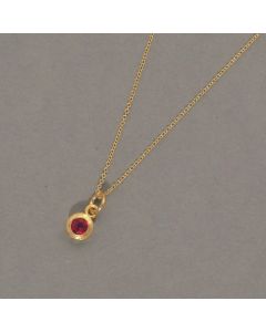 Elegant Gilded Necklace with Garnet Pendant
